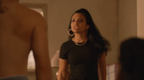 Woman Wearing Hoop Earrings GIF