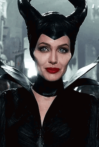 Woman Wearing Horned Black Hat And Red Lips GIF