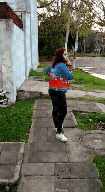 Woman Wearing Jacket Saying Flame GIF