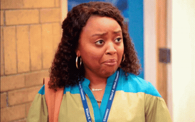 Woman Wearing Lanyard Saying Wilson R. Williams Elementary GIF