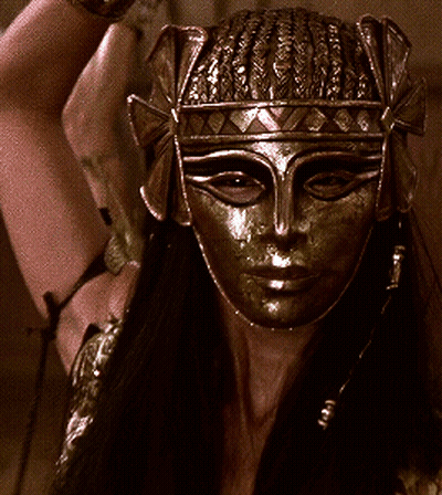 Woman Wearing Mask And Crown GIF