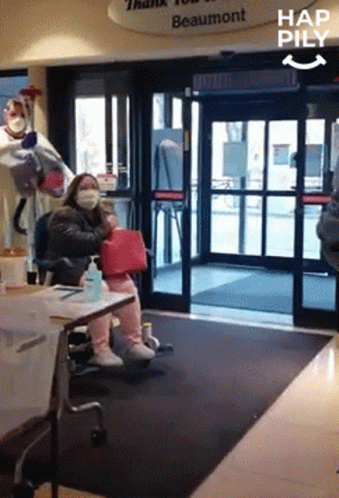 Woman Wearing Mask At Beaumont Sign GIF