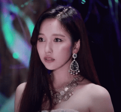 Woman Wearing Necklace And Earrings GIF
