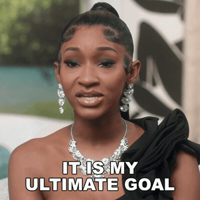 Woman Wearing Necklace And Earrings Says It Is My Ultimate Goal GIF
