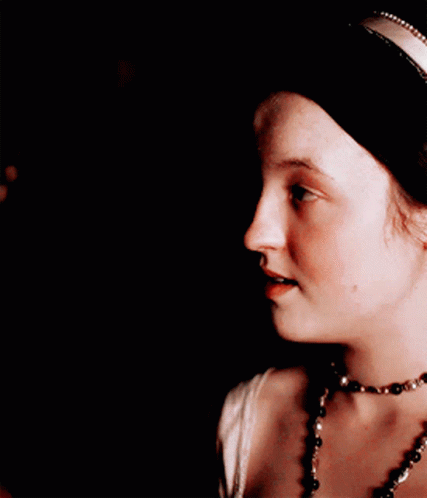 Woman Wearing Necklace And Red Headband GIF