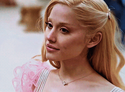 Woman Wearing Necklace With Letter Q GIF
