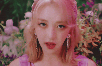 Woman Wearing Pink Earrings Close Up GIF