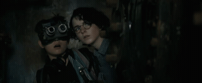 Woman Wearing Pink Headphones GIF