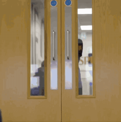 Woman Wearing Purple Spurs Shirt GIF