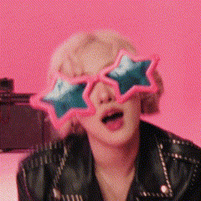 Woman Wearing Star Shaped Sunglasses GIF