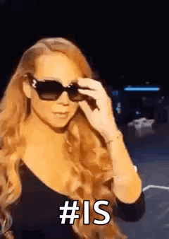 Woman Wearing Sunglasses And Black Top Holding Sunglasses Over Eyes GIF