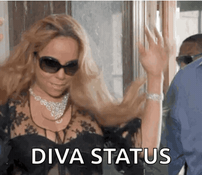 Woman Wearing Sunglasses And Necklace Diva Status GIF