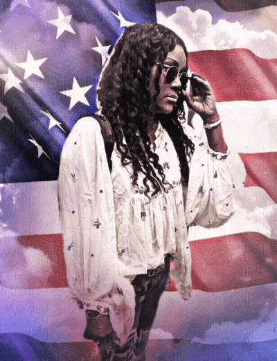 Woman Wearing Sunglasses In Front Of American Flag GIF