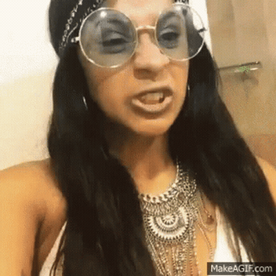 Woman Wearing Sunglasses Making Funny Face GIF