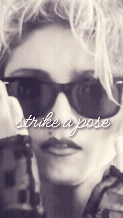 Woman Wearing Sunglasses Strike A Pose GIF