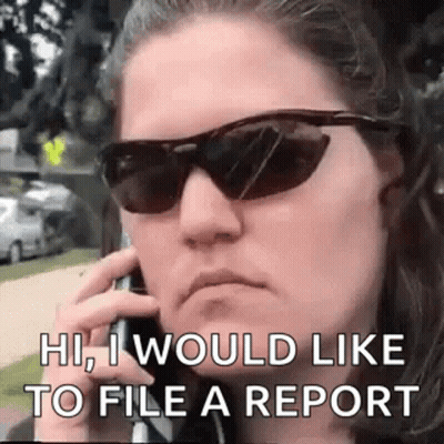 Woman Wearing Sunglasses Talking On Phone GIF