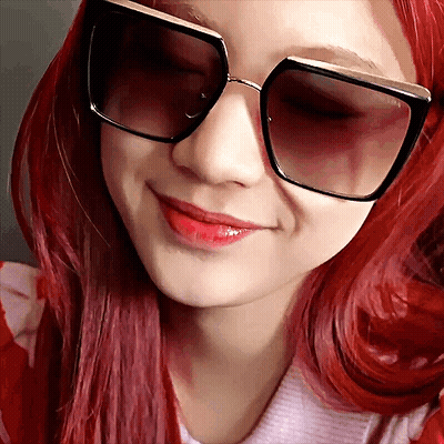 Woman Wearing Sunglasses With Eyes Closed GIF