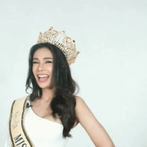 Woman Wearing Tiara And Sash Saying Miss GIF