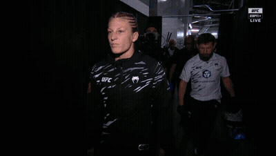 Woman Wearing UFC Jacket Walking GIF