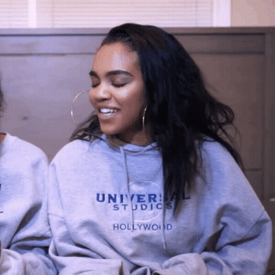 Woman Wearing Universal Studios Hoodie GIF