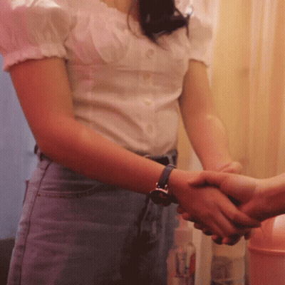 Woman Wearing Watch Shaking Hands With Man GIF
