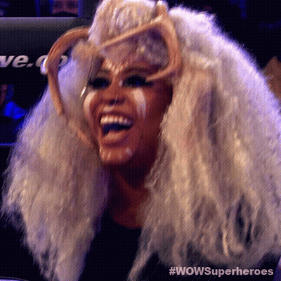 Woman Wearing Wig With Wow Superheroes GIF