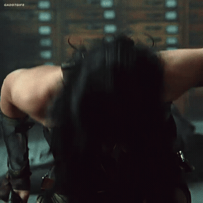 Woman Wearing Wonder Woman Headpiece GIF