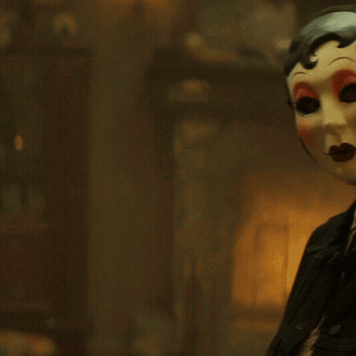 Woman Wearing Yellow Mask With Red Lips GIF