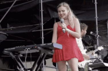Woman Wedding Singer Plays Piano GIF