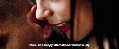 Woman Whispering Relax And Happy International Women's Day In Man's Ear GIF