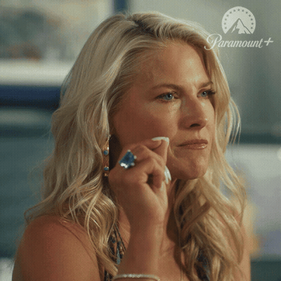 Woman Wiping Face With Paramount Logo GIF