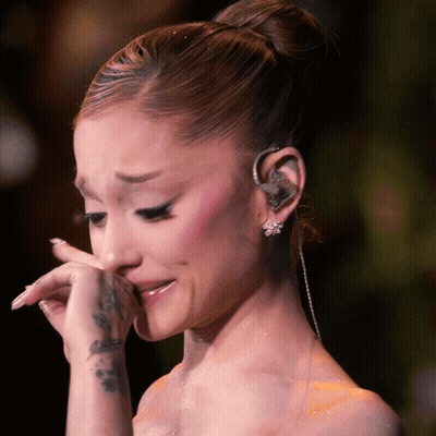 Woman Wiping Face With Wrist Tattoo GIF