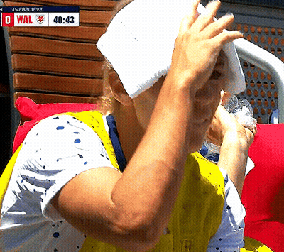 Woman Wiping Forehead With Towel Scoreboard 0 Wal GIF