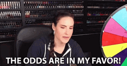 Woman Wishes May The Odds Be In Your Favor GIF