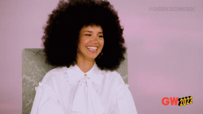 Woman With Afro Smiling Gw 2022 GIF