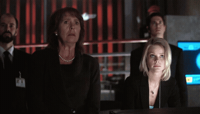 Woman With Amanda Name Tag Looking GIF