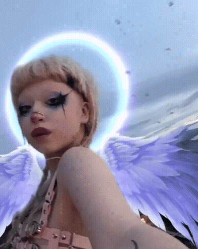 Woman With Angel Wings And Halo Selfie GIF
