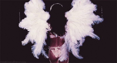 Woman With Angel Wings And Models GIF