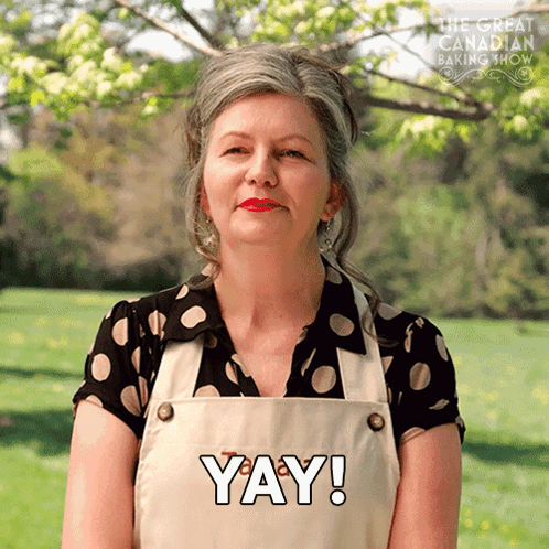 Woman With Apron Saying Yay GIF