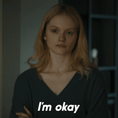 Woman With Arms Crossed Saying I'm Okay GIF