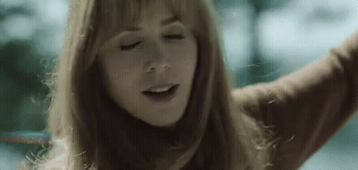 Woman With Arms Outstretched Eyes Closed GIF