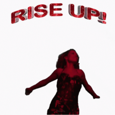Woman With Arms Outstretched Saying Rise Up GIF