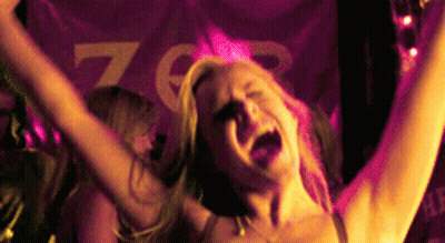 Woman With Arms Up In Front Of Z Sign GIF