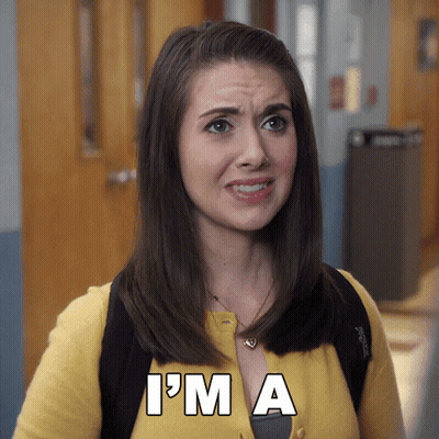Woman With Backpack Saying I'm A GIF