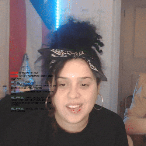 Woman With Bandana And Hoop Earrings Smiling GIF