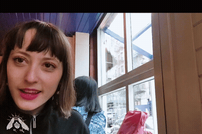 Woman With Bee Necklace GIF