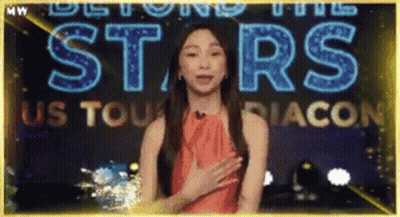 Woman With Beyond The Stars US Tour Sign GIF