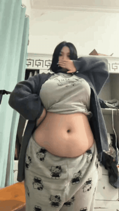 Woman With Big Belly In Hello Kitty Pajamas GIF