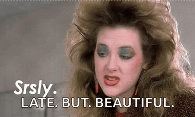 Woman With Big Haircut Makeup Running Late GIF