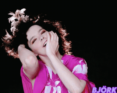 Woman With Bjork Behind Her GIF